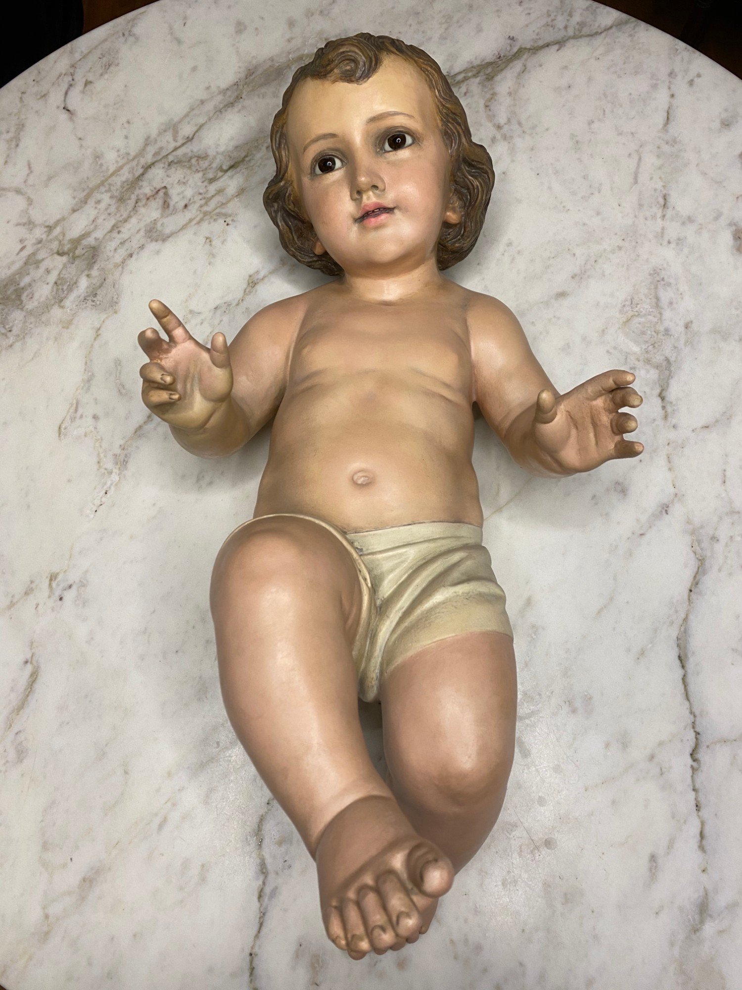 Repair and Repainting of an Infant Jesus Figure — Repairs and repainting, photo 1
